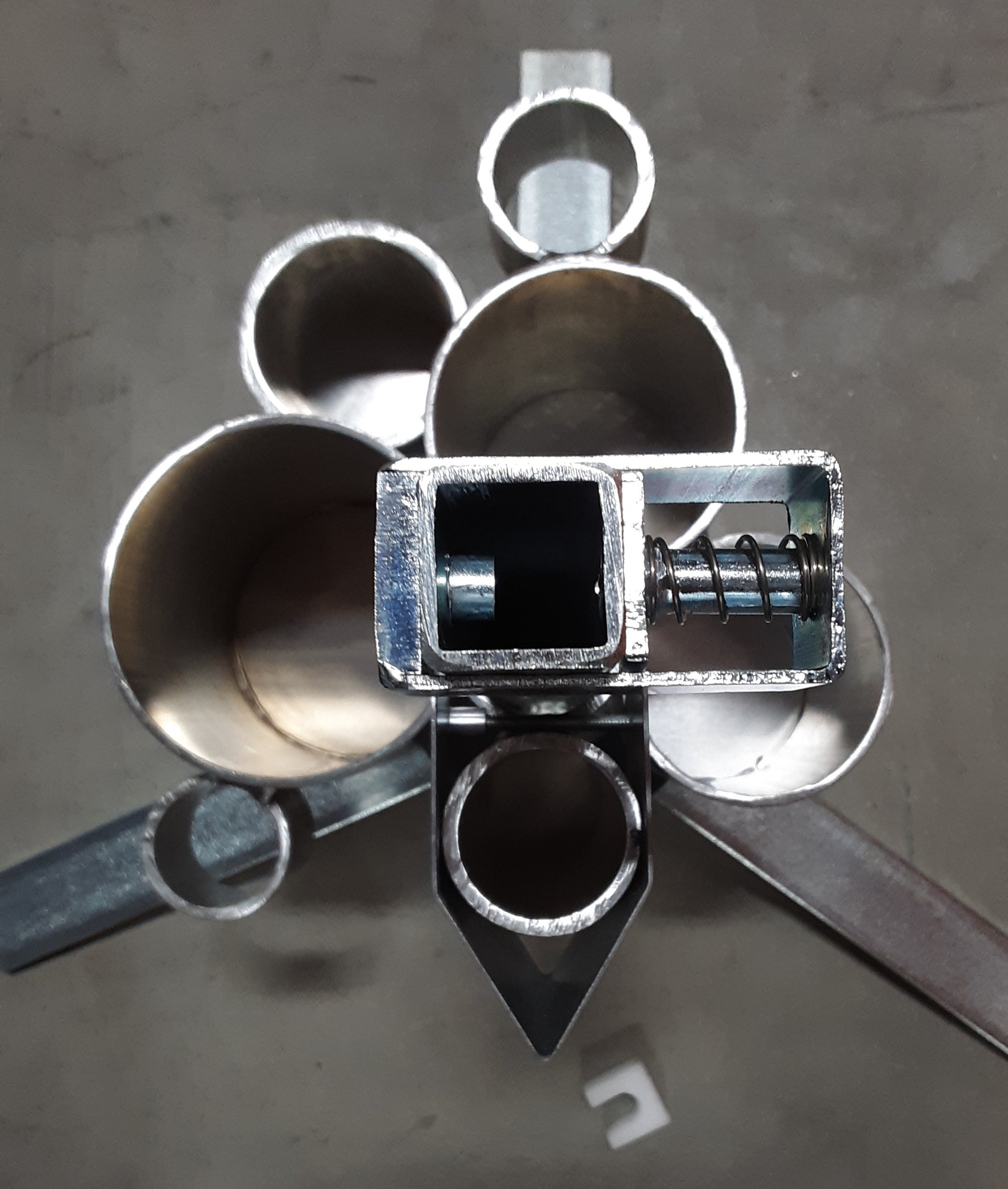 Photo of Jaime Jackson's professional tripod hoof stand with tool caddy, the most sophisticated tripod hoof stand especially designed for the natural hoof care practitioners designed by a former farrier and hoof care expert. It includes height adjustment and flip cradle.