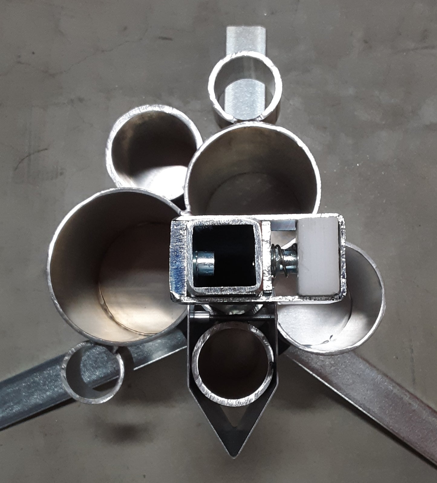 Photo of Jaime Jackson's professional tripod hoof stand with tool caddy, the most sophisticated tripod hoof stand especially designed for the natural hoof care practitioners designed by a former farrier and hoof care expert. It includes height adjustment and flip cradle.