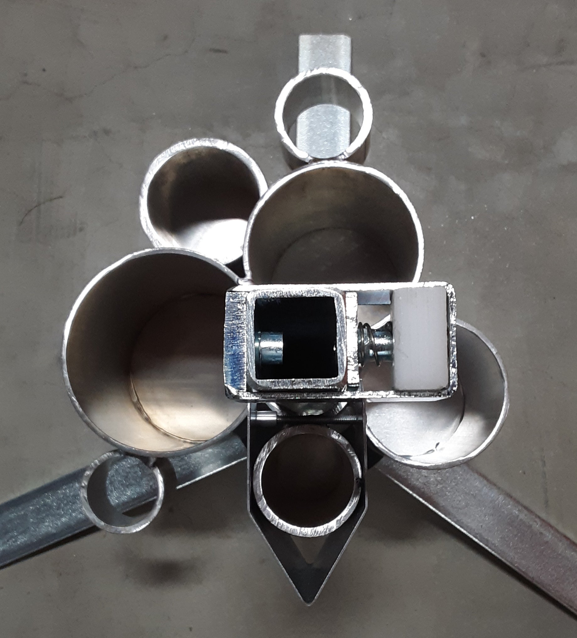 Photo of Jaime Jackson's professional tripod hoof stand with tool caddy, the most sophisticated tripod hoof stand especially designed for the natural hoof care practitioners designed by a former farrier and hoof care expert. It includes height adjustment and flip cradle.