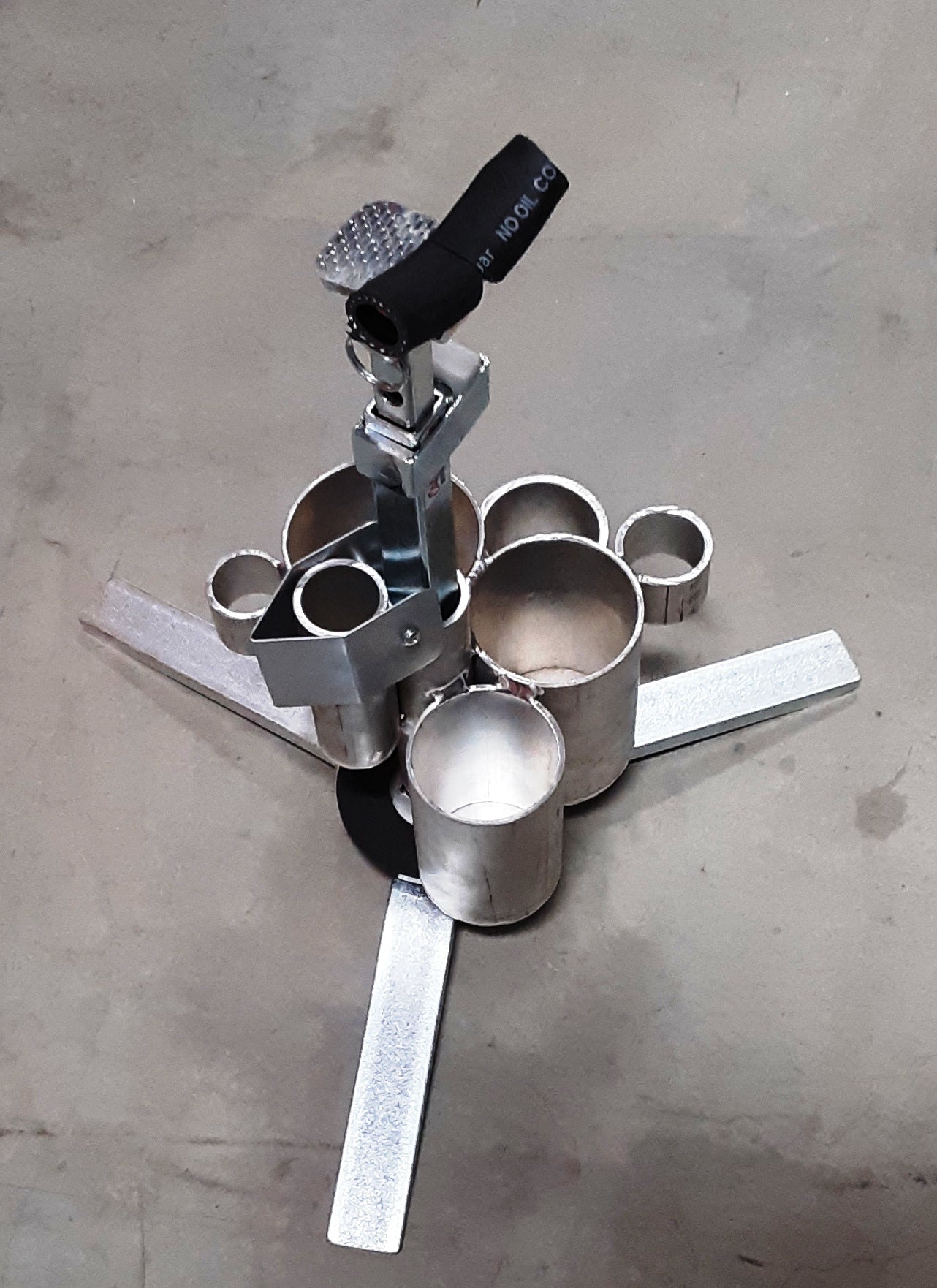 Photo of Jaime Jackson's professional tripod hoof stand with tool caddy, the most sophisticated tripod hoof stand especially designed for the natural hoof care practitioners designed by a former farrier and hoof care expert. It includes height adjustment and flip cradle. 